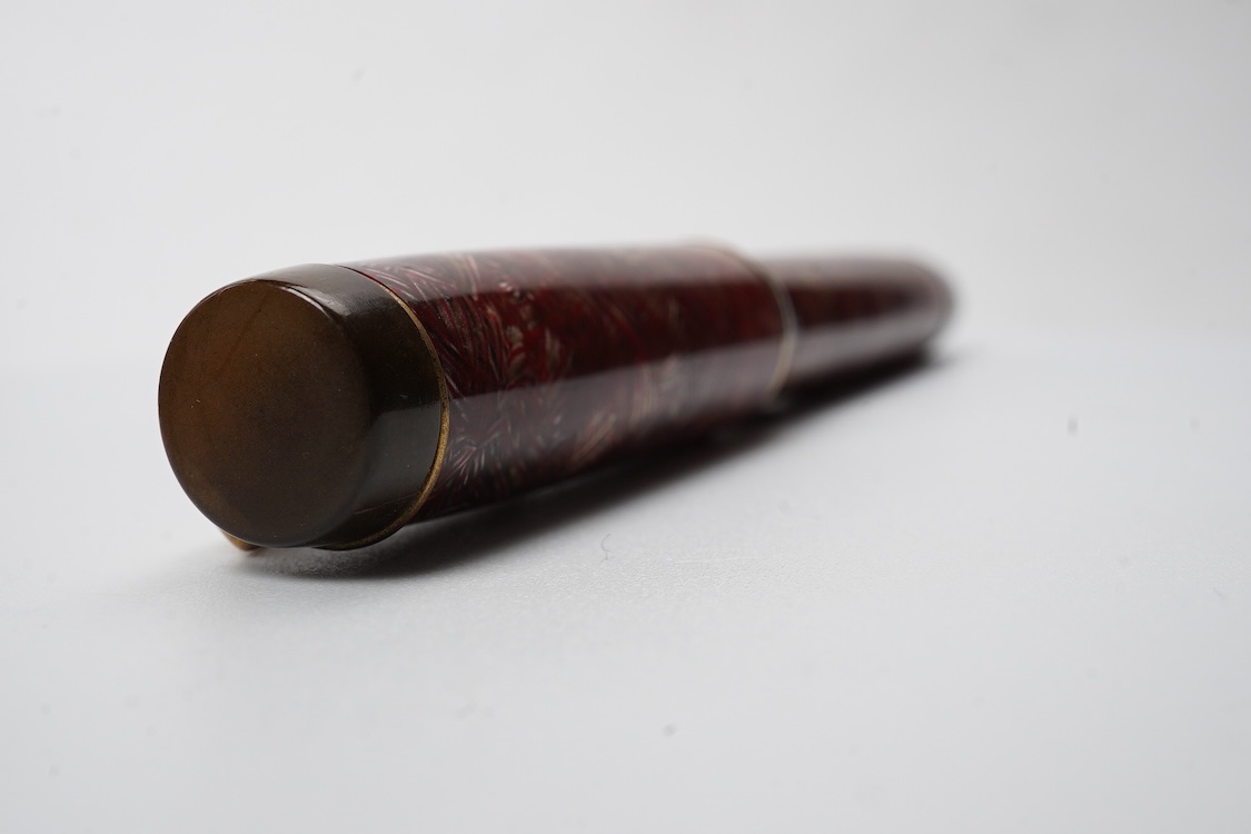 A Parker Senior UK Duofold 'red candy stripe' fountain pen with 14ct. gold 'N' nib